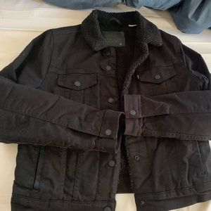 Levi’s black Sherpa Jean Trucker Jacket